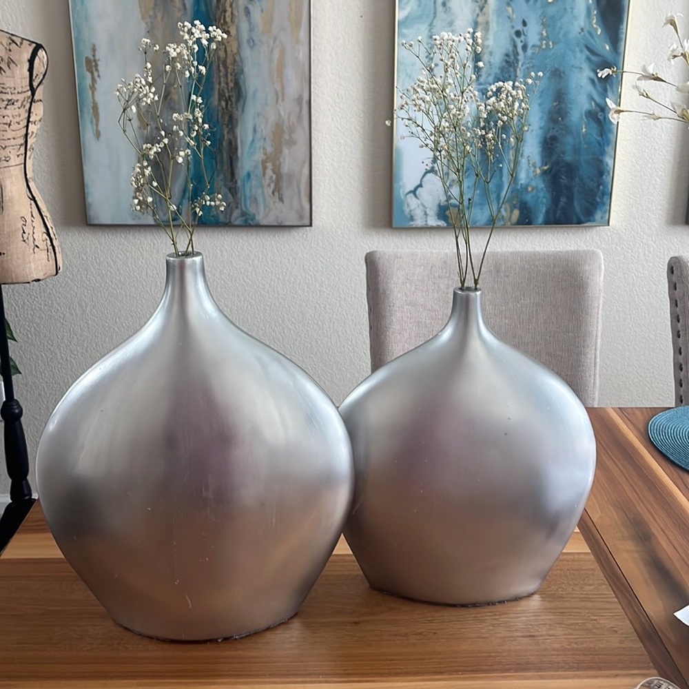 Two Set Vases long necks. 
Gently used . See pictures